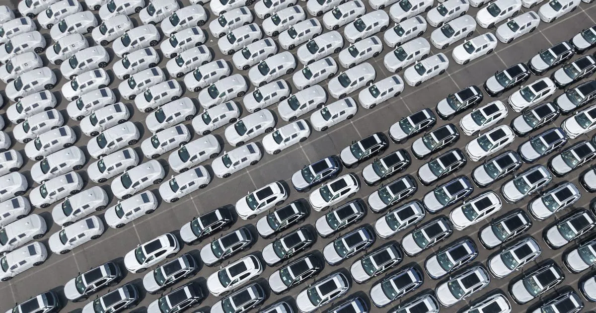 Electric vehicles parked outside a car showroom